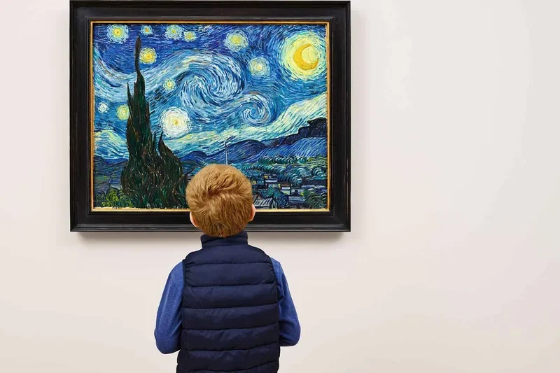 Visitors viewing modern art paintings inside MoMA, one of the museums in New York worth booking tickets for in advance